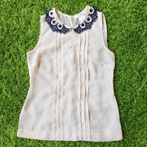 Peach ribbed blouse with embroidory collar
